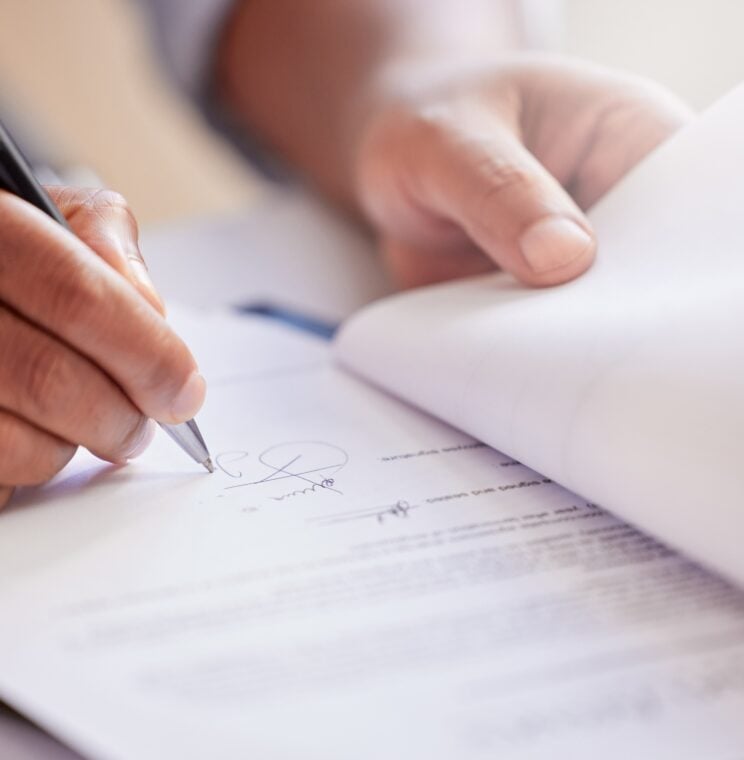 Hands,,Signature,And,Writing,On,Contract,For,Deal,At,Record