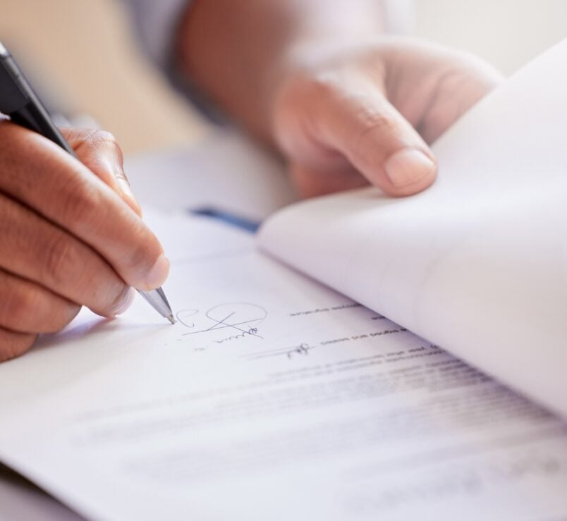 Hands,,Signature,And,Writing,On,Contract,For,Deal,At,Record