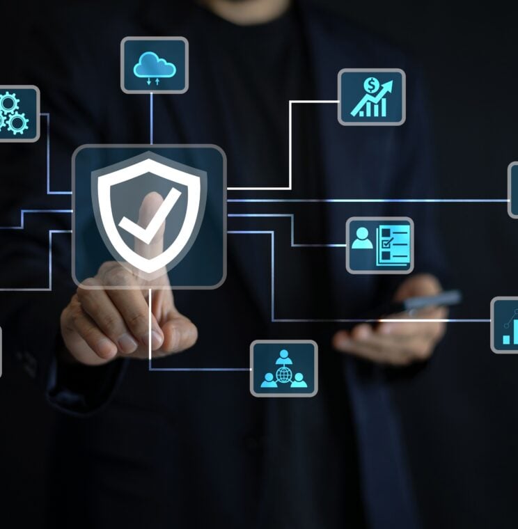An,It,Specialist,Using,A,Smartphone,Configures,Cloud-based,Security,Solutions