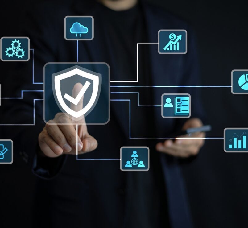 An,It,Specialist,Using,A,Smartphone,Configures,Cloud-based,Security,Solutions